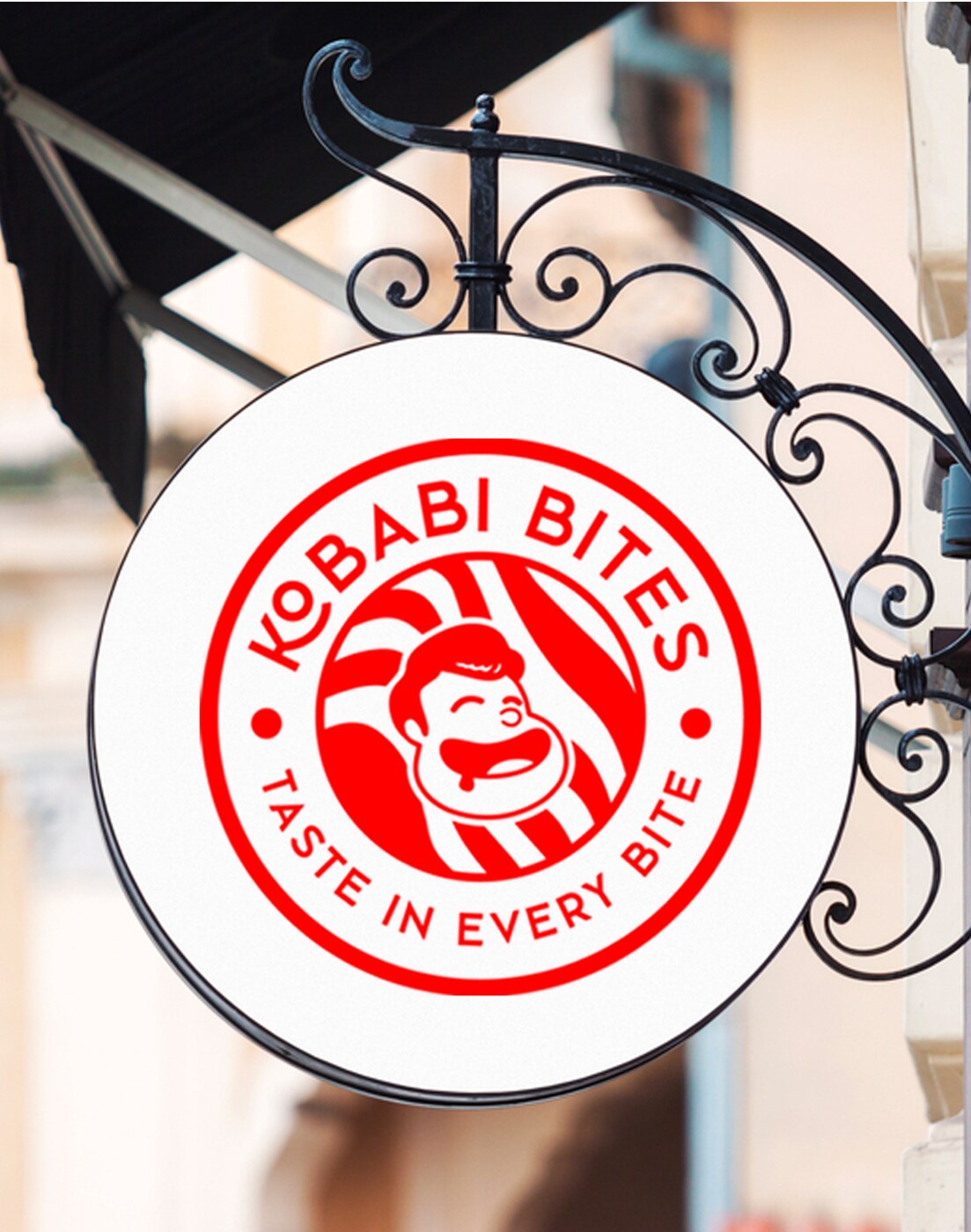 The Kobabi Bites roundel on a hanging shop sign