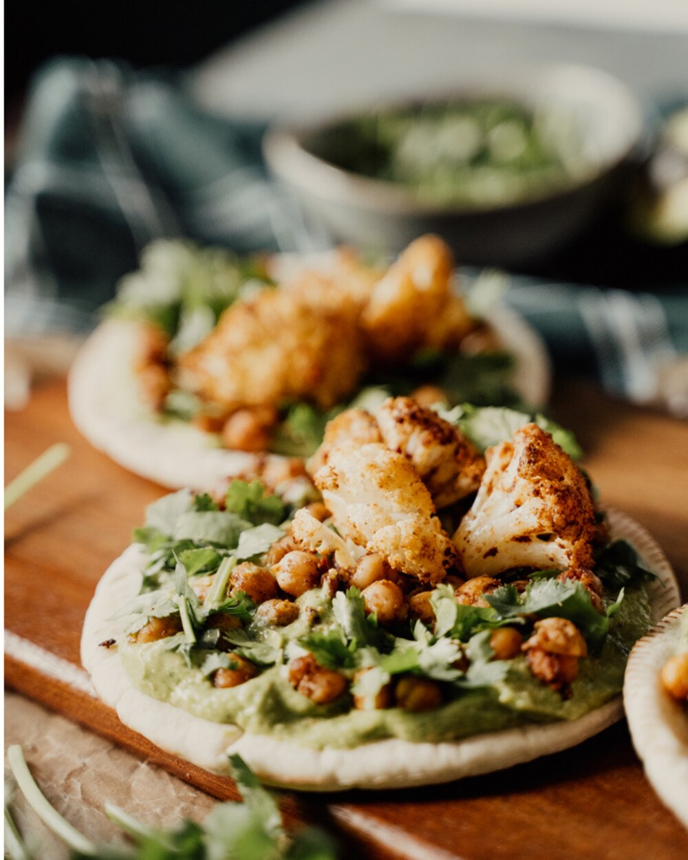Flatbread wraps loaded with spiced filling and fresh greens