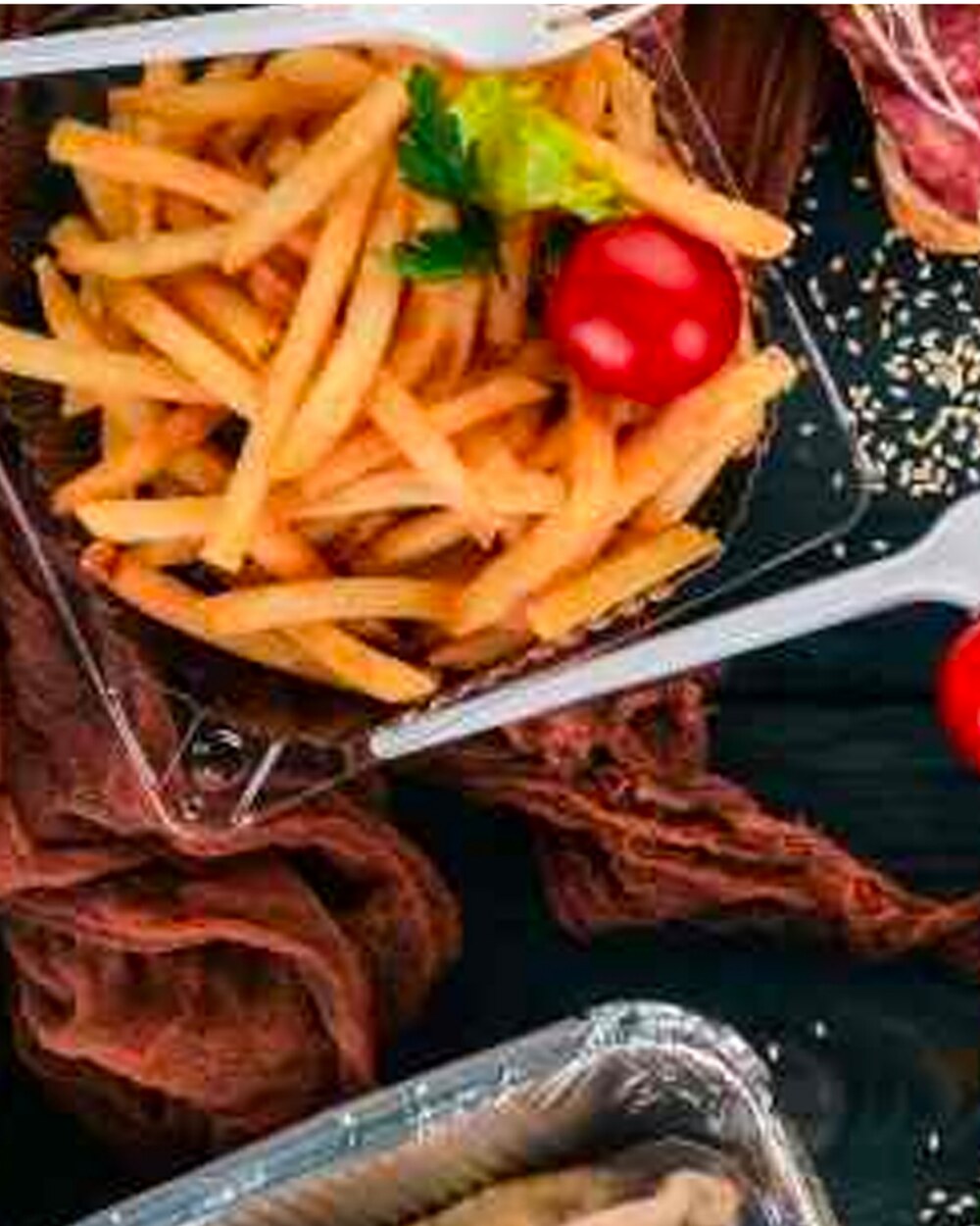 Basket of fries served with dips