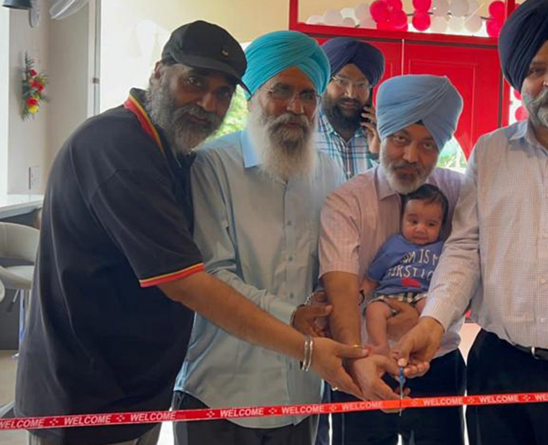 Ribbon-cutting ceremony at a Kobabi Bites outlet opening
